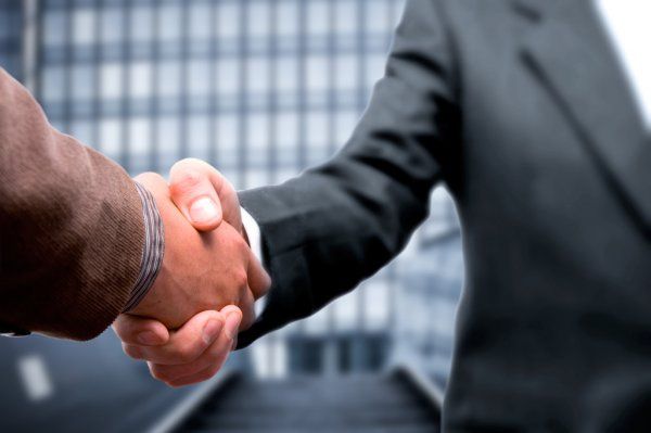 handshake after closing the deal